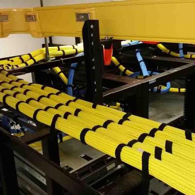 Cabling Contractor Combing Cables On Ladder Tray